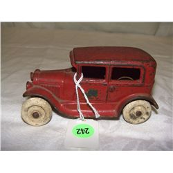 5" red Arcade cast iron car with label
