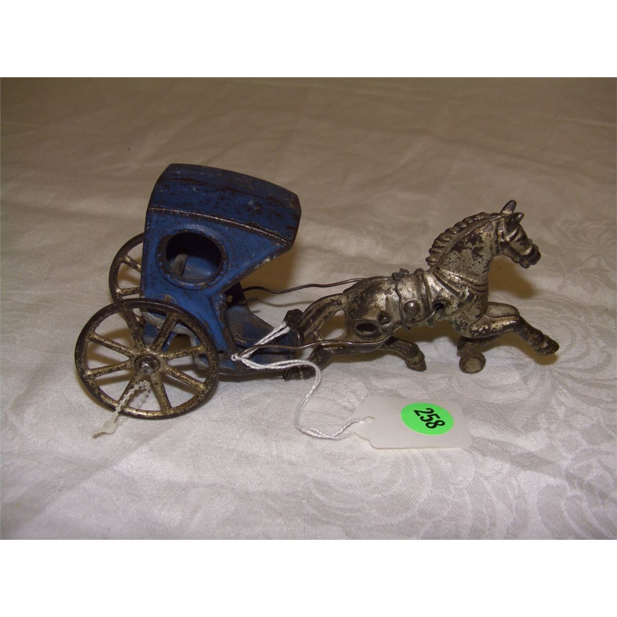 cast iron horse and wagon toy