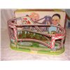 Image 1 : 9 1/2" tall. tin wind up roller coaster in box, with cars