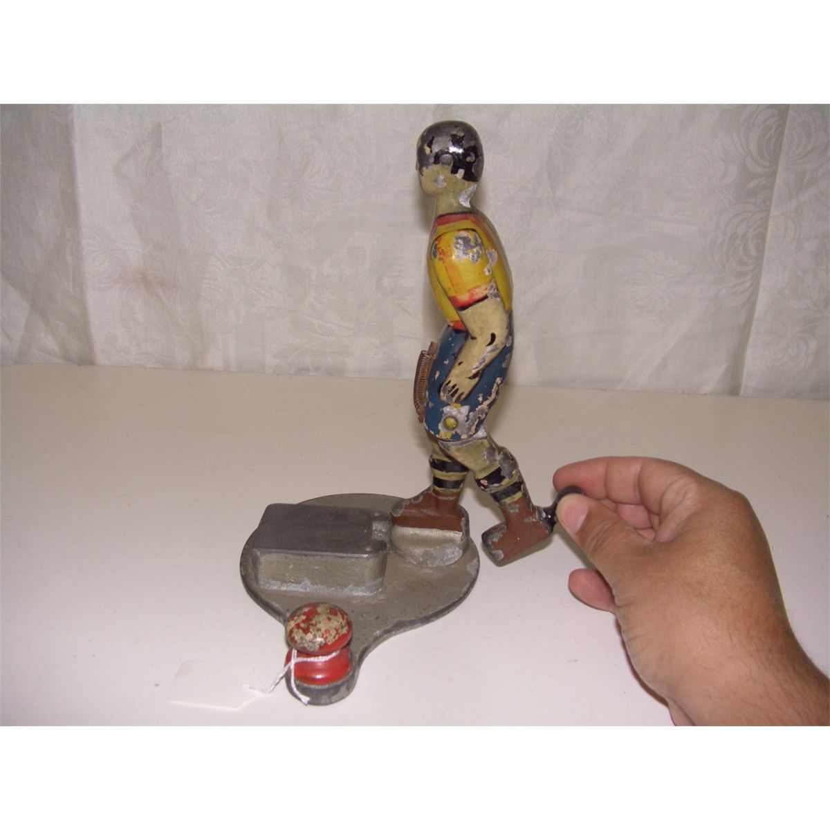 vintage cast iron football / soccer kicker toy