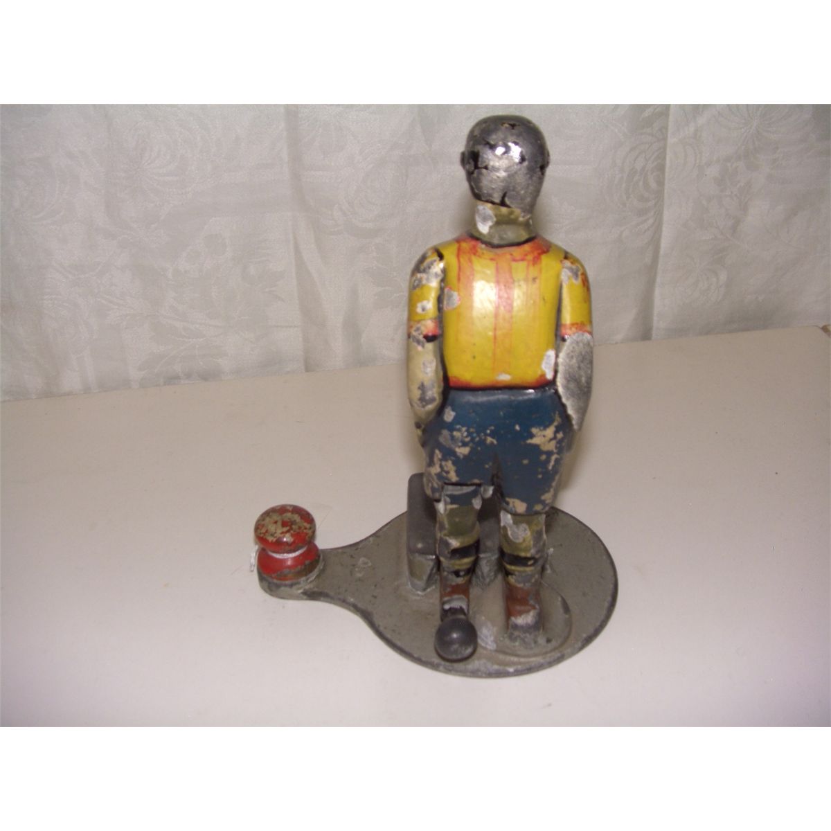 vintage cast iron football / soccer kicker toy