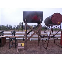 fuel barrel on wood stand