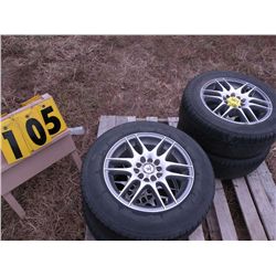 4 American Racing 15" Aluminum Rims w/tires