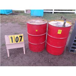 Qty 2 oil drums & 1 pump