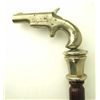 Image 1 : Antique walking stick with cast Colt Thuer