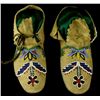 C. 1880's Santee Sioux partially beaded moccasins