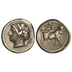 Didracma. 340-241 a.C. NEAPOLIS. CAMPANIA. Anv.: Cabeza diademada de Ninfa a izquierda, detrás símbo