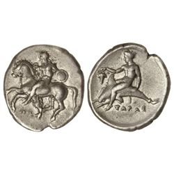 Didracma. 302-281 a.C. TARAS. CALABRIA. Anv.: Jinete desnudo con escudo a izquierda. Rev.: Taras sen