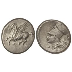 Estátera. 350-306 a.C. CORINTO. Anv.: Pegaso a izquierda, debajo símbolo. Rev.: Cabeza de Atenea con