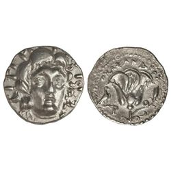 Didracma. 304-167 a.C. RODAS. Anv.: Cabeza de Helios de frente, 3/4 a derecha. Rev.: Rosa, encima le