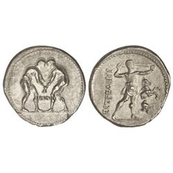 Estátera. 370-333 a.C. ASPENDOS. Anv.: Dos atletas frente a frente, peleando. Rev.: Hondero avanzand