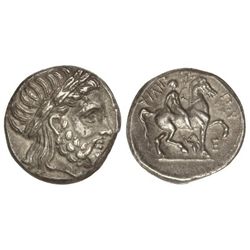 Tetradracma. 359-336 a.C. FILIPO II. AMPHIPOLIS. Anv.: Cabeza laureada de Zeus a derecha. Rev.: Jine