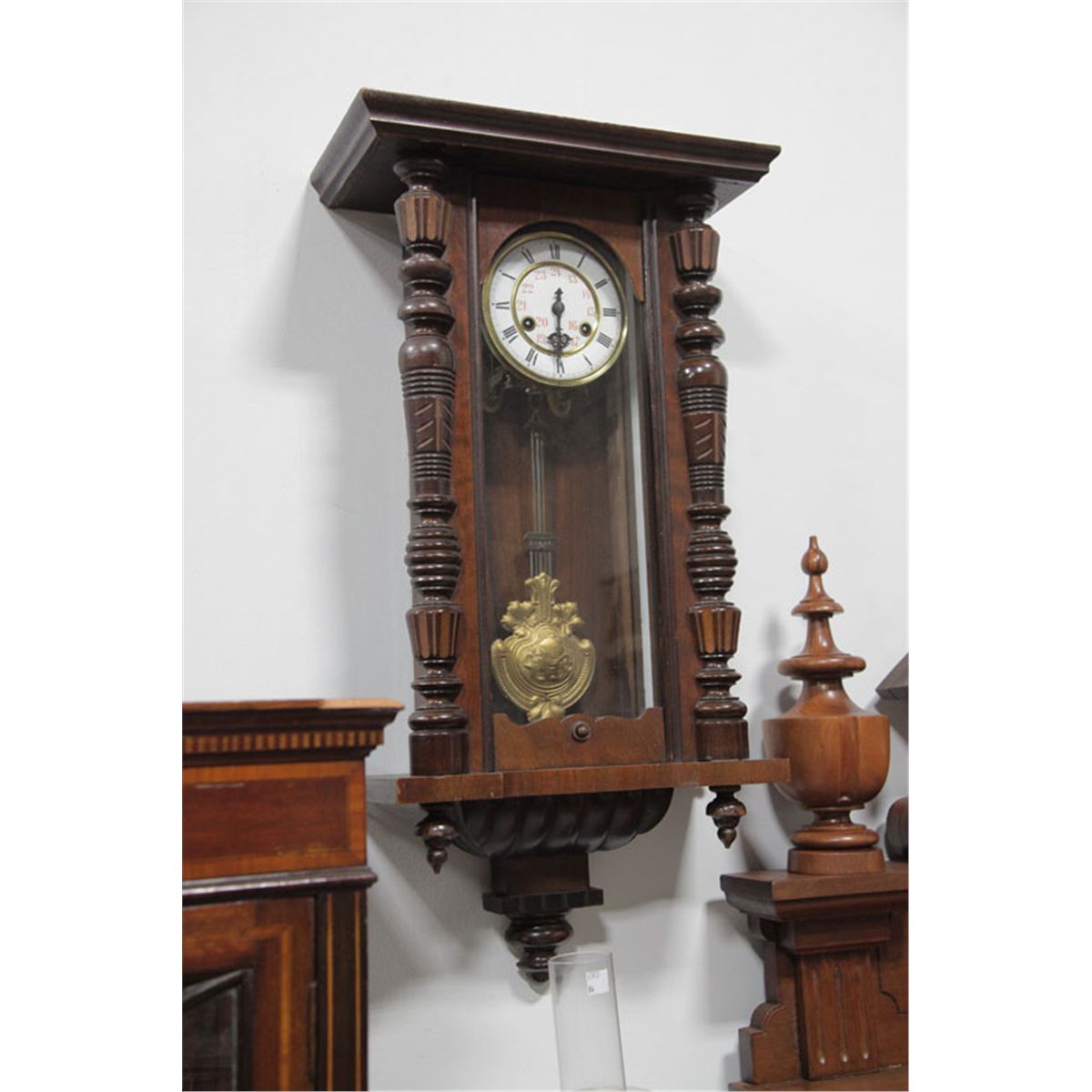 GERMAN WALL CLOCK. Eight day, time/strike with porcelain dial and brass ...