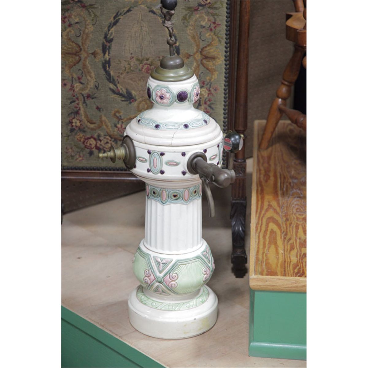 CERAMIC BEVERAGE DISPENSER. Majolicatype soda fountain dispenser with