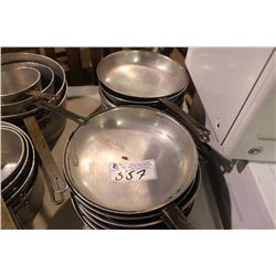 2 STACKS OF FRYING PANS