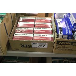 BOX OF WEISER DEAD BOLT SETS AND PRIVACY LEVER