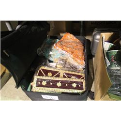 SUITCASE OF SARI AND JEWELED PURSES