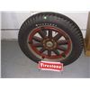 Image 1 : original Firestone wood spoke tire 1920's with newer Firestone wheel display rack  SSR