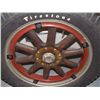 Image 2 : original Firestone wood spoke tire 1920's with newer Firestone wheel display rack  SSR