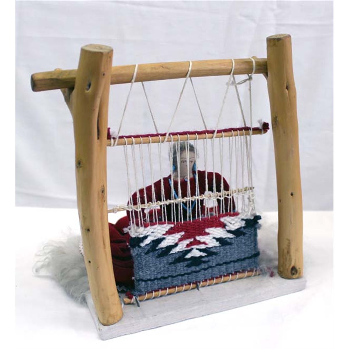 Navajo Doll Weaving At Loom