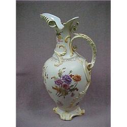 Porcelain ewer, 16" h., with raised swirl d