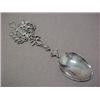 Image 1 : Silver serving spoon, repousse handle depic