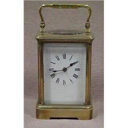 French carriage clock with brass and bevele