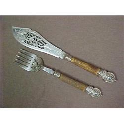 Horn handled carving set with silver repous