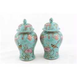 Pair Guanxu Famille Rose vases with cover