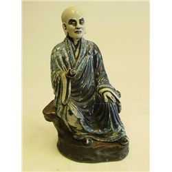 Glazed Chinese pottery figure signed