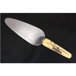 Scrimshaw handle cake server signed Migurnk