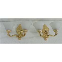 Pair brass sconces with frosted glass shades