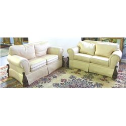 Pair ivory upholstered loveaseats