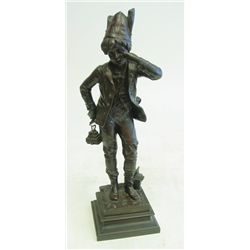 Bronze figure of "Boy Wearing Dunce Cap" H PE
