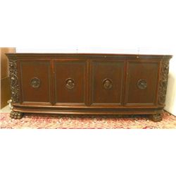 Heavily carved oak paw foot credenza cabinet
