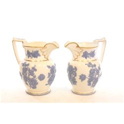 Pair early 19th c. Tucker pitchers