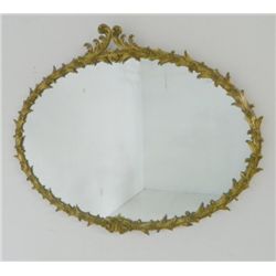 Large oval gilt floral mirror