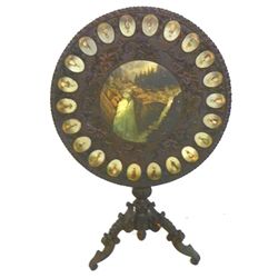 19th c. Black Forest carved tilt top table