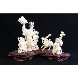 Chinese carved ivory on rosewood base