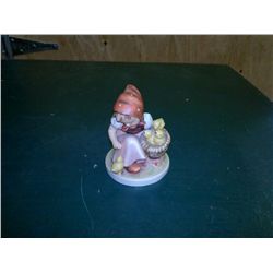 Hummel Figurine tending to chicks