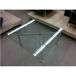 Designer glass and chrome coffee table