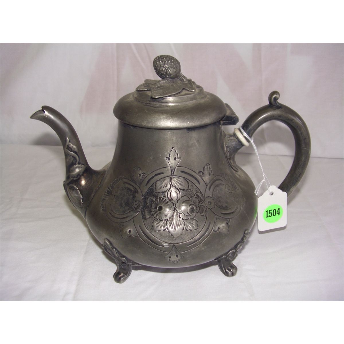 antique hand chased silver plated tea pot with Ivory handle spacers