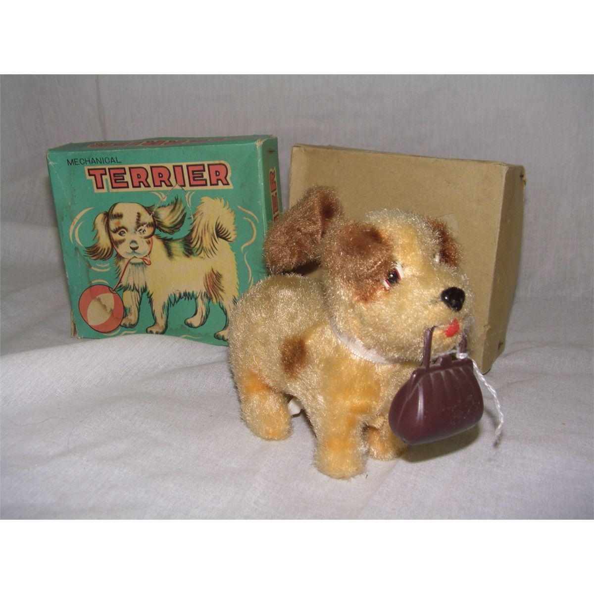 vintage wind up toy Japan dog with purse, in box