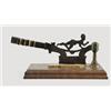 OUTSTANDING FIGURAL TOBACCO CUTTER.