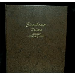 Complete Eisenhower Dollar Set in new Dansco Binder.  All 32 coins including all Proofs