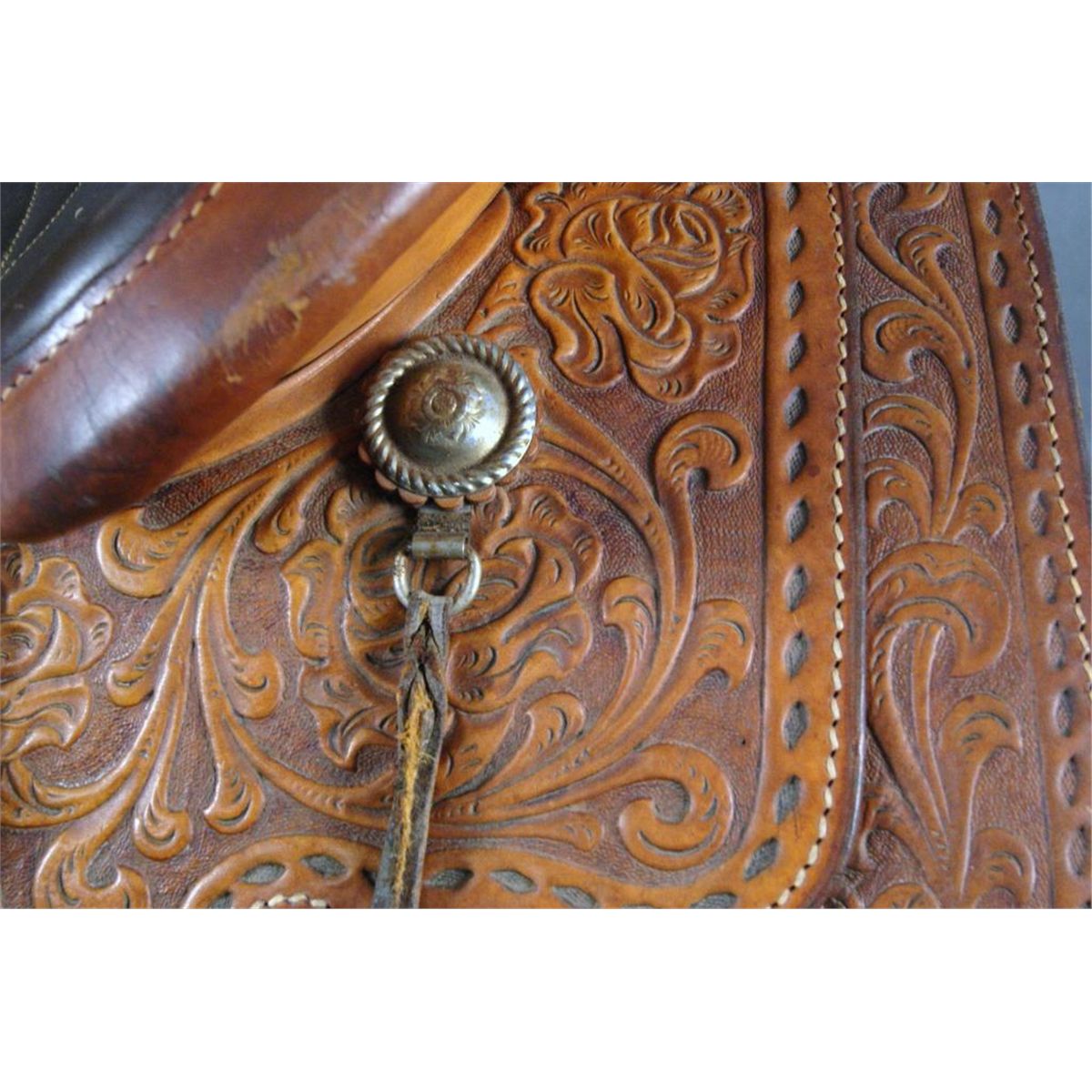 Vintage Keystone hand tooled leather saddle