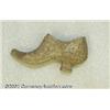 Image 1 : Macerated Currency Shoe.