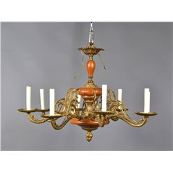 A Brass and Wood Eight Light Chandelier