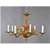 Image 1 : A Brass and Wood Eight Light Chandelier