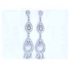 Image 1 : 14k White Gold Dangling Earrings with Diamonds